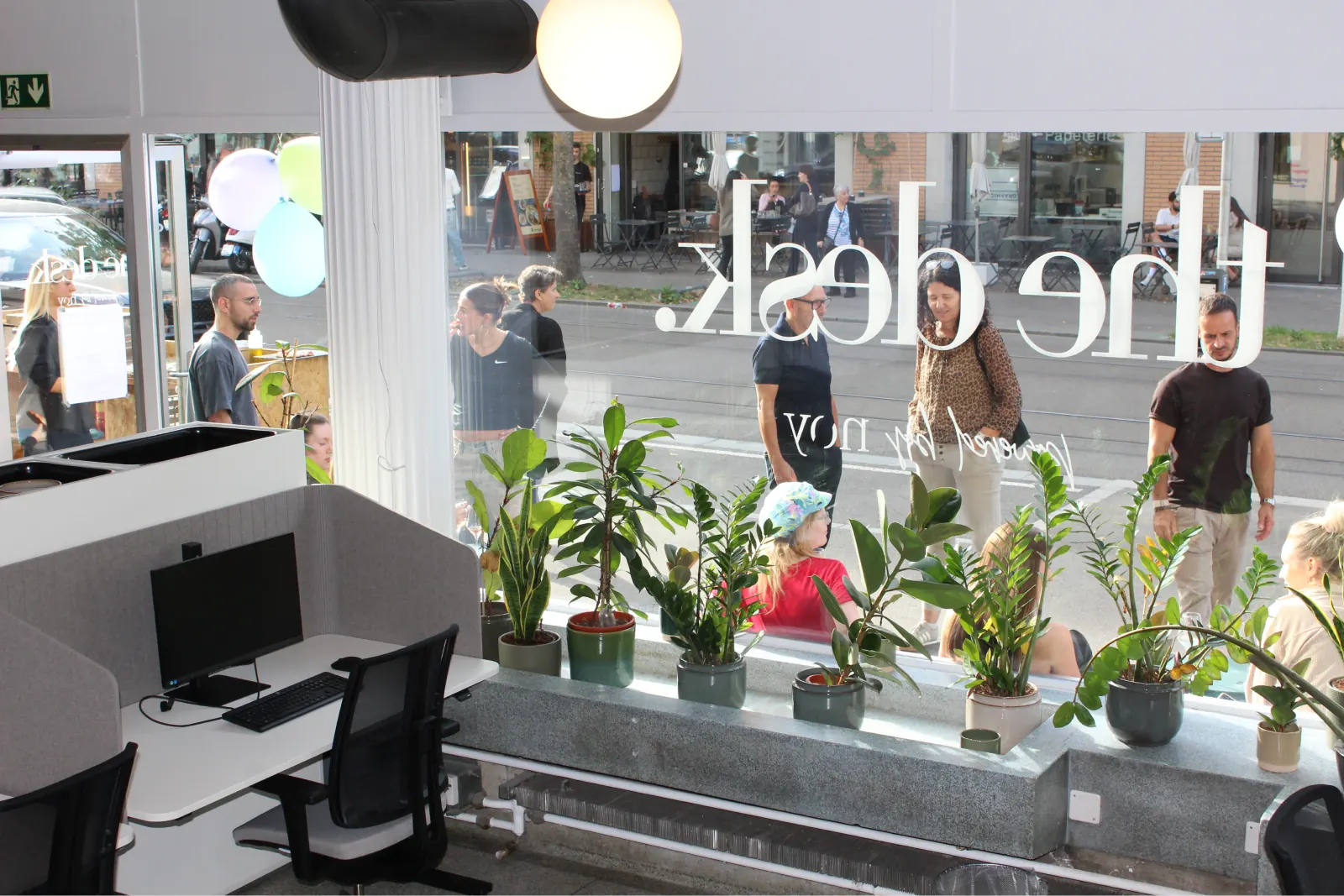View through the shop window to the guests outside